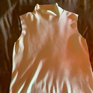 Ivory fitted, turtle neck tank
